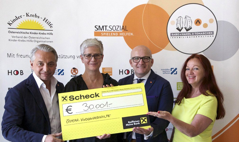 SMT Charity Scheck € 30.001